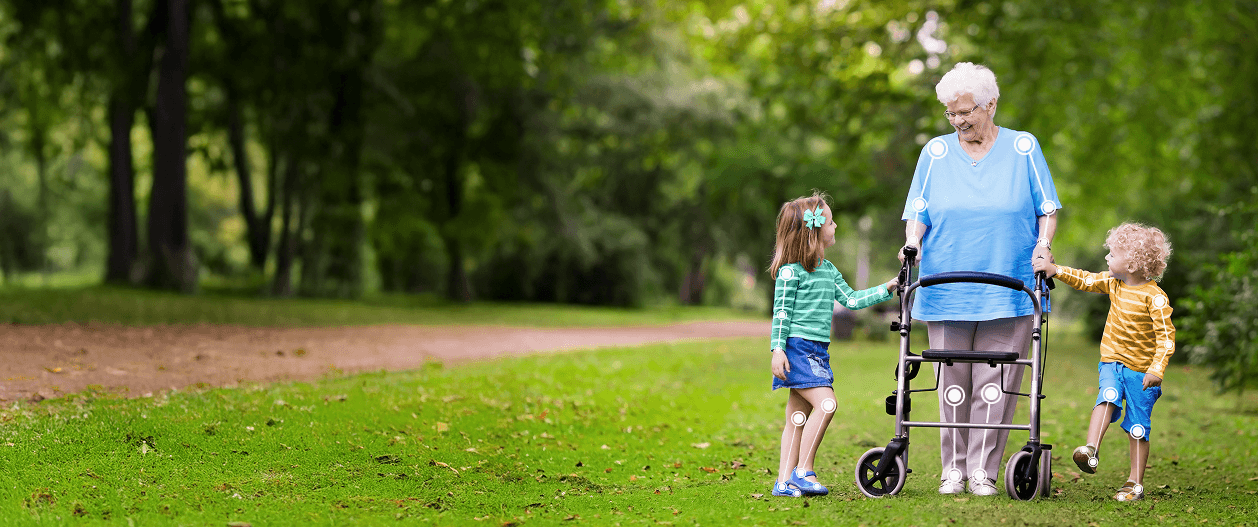 old woman with walker and two children